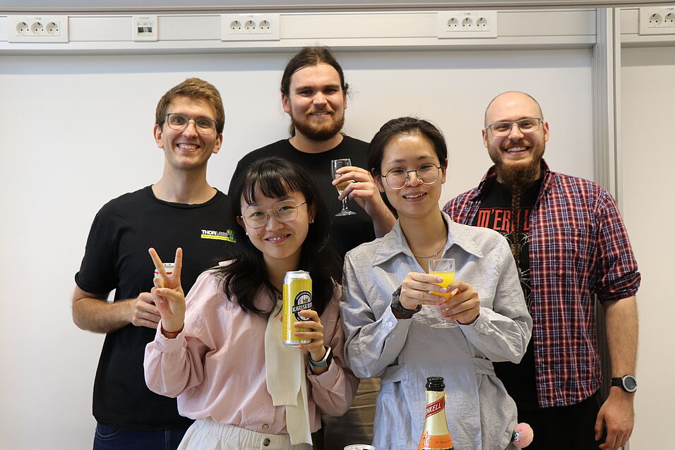 People celebrating in the new lab.