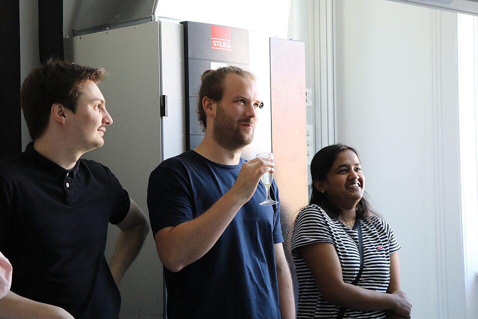 People celebrating in the new lab.