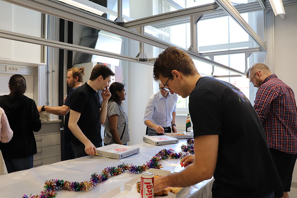 People celebrating in the new lab.