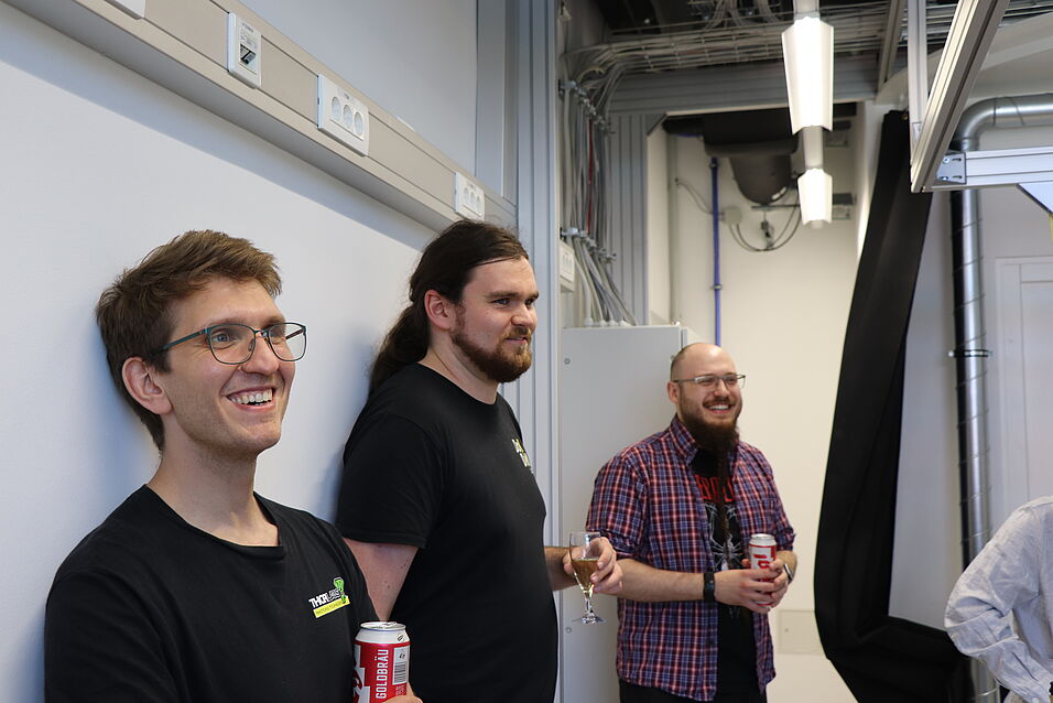 People celebrating in the new lab.